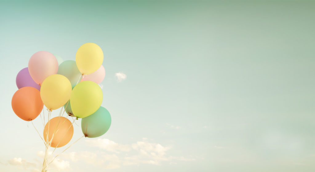 balloons floating in the sky